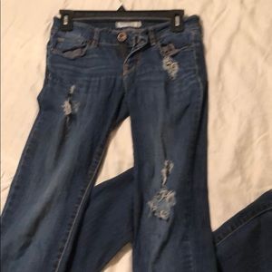 Distressed ripped jeans